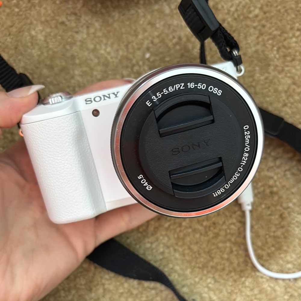 Sony White Digital Camera (includes pink case)